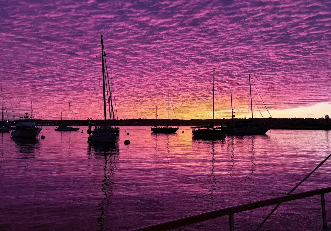 Beautiful Sunset seen from onboard Romancing the Wind sailing yacht charter in San Diego